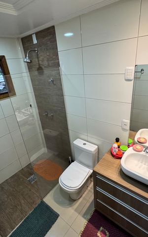 Casa à venda com 942m², 3 quartos e 4 vagas Casa à venda com 942m², 3 quartos e 4 vagasBanheiro da Suíte 1