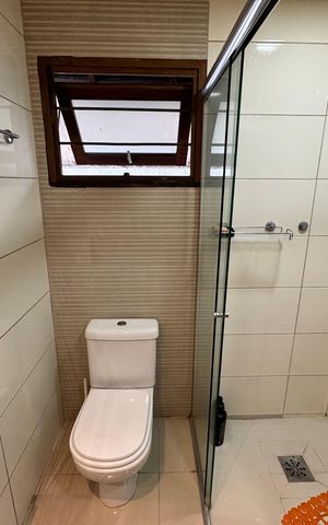 Casa à venda com 942m², 3 quartos e 4 vagas Casa à venda com 942m², 3 quartos e 4 vagasBanheiro da Suíte 2