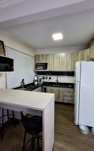 Casa à venda com 135m², 3 quartos e 2 vagas Casa à venda com 135m², 3 quartos e 2 vagasCozinha