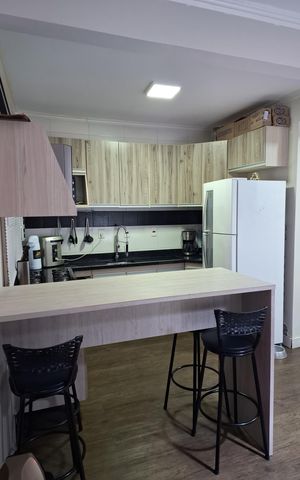 Casa à venda com 135m², 3 quartos e 2 vagas Casa à venda com 135m², 3 quartos e 2 vagasCozinha