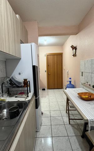 Apartamento à venda com 58m², 2 quartos e 1 vaga Apartamento à venda com 58m², 2 quartos e 1 vagaCozinha e Área de Serviço