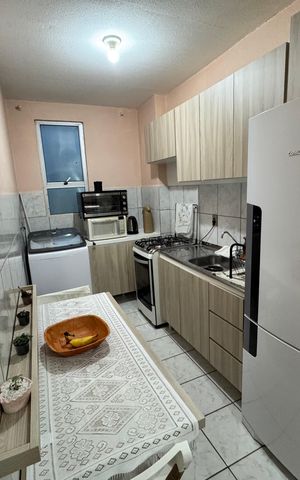 Apartamento à venda com 58m², 2 quartos e 1 vaga Apartamento à venda com 58m², 2 quartos e 1 vagaCozinha e Área de Serviço