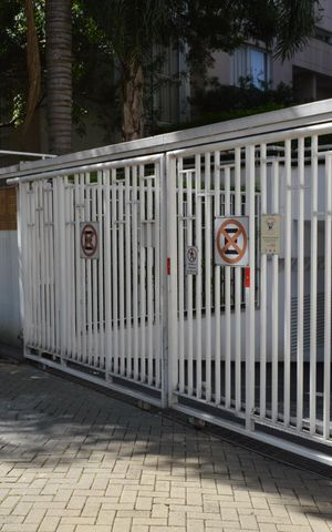 Apartamento à venda com 100m², 3 quartos e 2 vagasFachada + Plaquinha