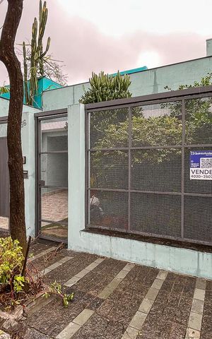 Casa à venda com 280m², 4 quartos e 5 vagasFachada + plaquinha