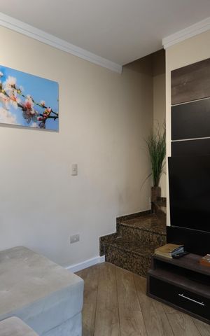 Casa de condomínio à venda com 86m², 2 quartos e 2 vagasSala