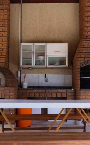 Casa de condomínio à venda com 140m², 3 quartos e 2 vagas Casa de condomínio à venda com 140m², 3 quartos e 2 vagasÁrea comum - Churrasqueira