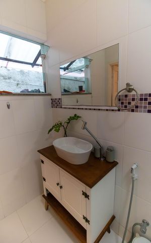 Casa de condomínio à venda com 245m², 4 quartos e 2 vagas Casa de condomínio à venda com 245m², 4 quartos e 2 vagasBanheiro da Suíte 2
