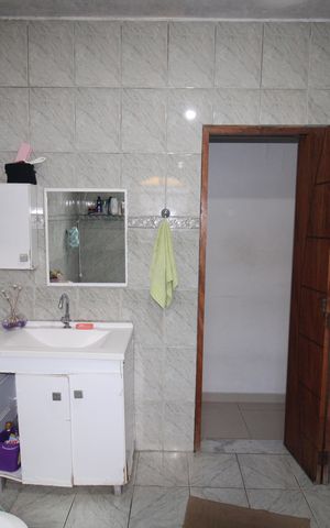 Casa à venda com 210m², 6 quartos e 1 vagaBanheiro