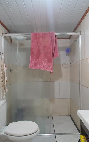 Casa à venda com 240m², 3 quartos e 2 vagasBanheiro 3