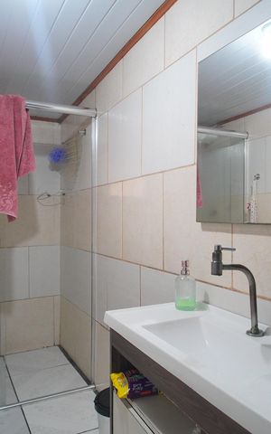 Casa à venda com 240m², 3 quartos e 2 vagasBanheiro 3