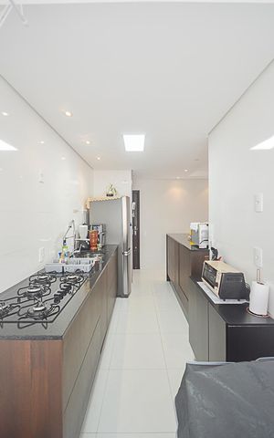 Apartamento à venda com 58m², 2 quartos e 1 vaga Apartamento à venda com 58m², 2 quartos e 1 vagaCozinha e Área de Serviço