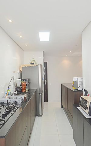 Apartamento à venda com 58m², 2 quartos e 1 vaga Apartamento à venda com 58m², 2 quartos e 1 vagaCozinha e Área de Serviço