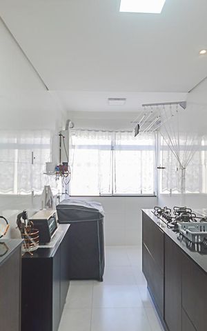 Apartamento à venda com 58m², 2 quartos e 1 vaga Apartamento à venda com 58m², 2 quartos e 1 vagaCozinha e Área de Serviço