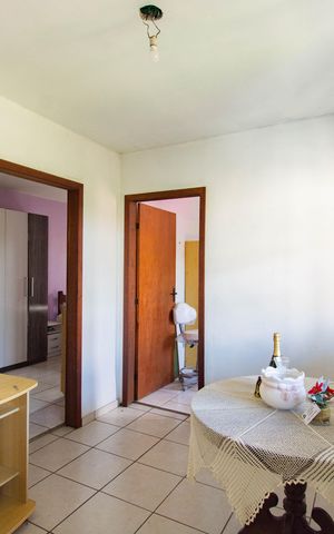 Casa à venda com 176m², 4 quartos e 2 vagas Casa à venda com 176m², 4 quartos e 2 vagasCorredor