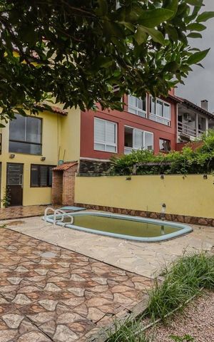 Casa à venda com 240m², 4 quartos e 2 vagas Casa à venda com 240m², 4 quartos e 2 vagasÁrea Externa