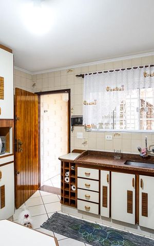 Casa à venda com 170m², 3 quartos e 2 vagas Casa à venda com 170m², 3 quartos e 2 vagasCozinha