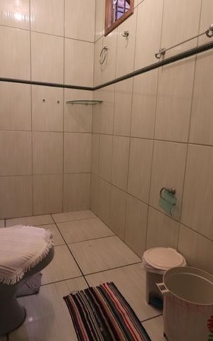 Casa à venda com 180m², 3 quartos e 2 vagasBanheiro