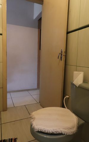 Casa à venda com 180m², 3 quartos e 2 vagasBanheiro