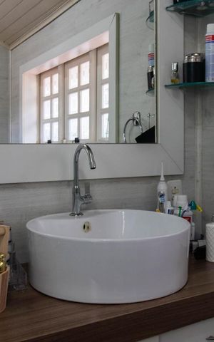 Casa à venda com 250m², 3 quartos e 4 vagasBanheiro da Suíte