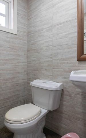 Casa à venda com 250m², 3 quartos e 4 vagasBanheiro da Suíte