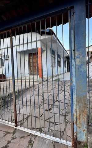 Casa à venda com 110m², 4 quartos e 5 vagas Casa à venda com 110m², 4 quartos e 5 vagasFachada + Placa