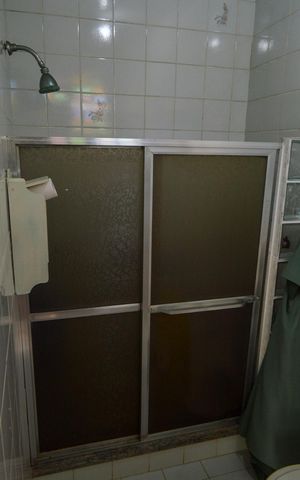 Casa à venda com 310m², 5 quartos e 4 vagas Casa à venda com 310m², 5 quartos e 4 vagasBanheiro da Área Gourmet