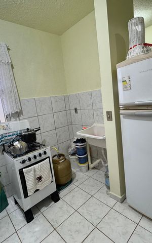Apartamento à venda com 48m², 2 quartos e 1 vaga Apartamento à venda com 48m², 2 quartos e 1 vagaCozinha