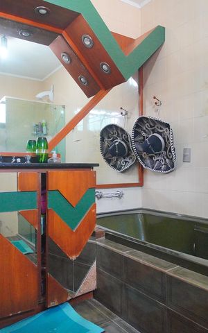 Casa à venda com 307m², 4 quartos e 2 vagasBanheiro da Suíte