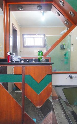 Casa à venda com 307m², 4 quartos e 2 vagasBanheiro da Suíte