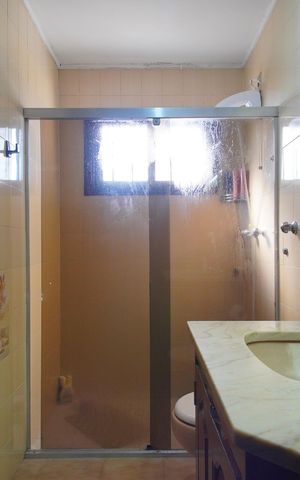 Casa à venda com 307m², 4 quartos e 2 vagasBanheiro 1