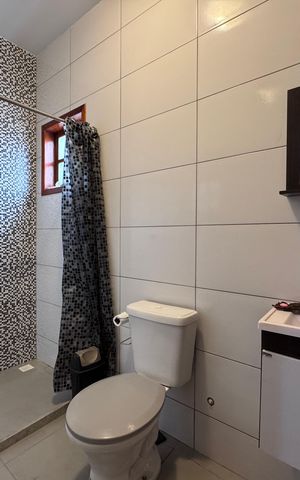 Casa de condomínio à venda com 250m², 4 quartos e 1 vagaBanheiro da Suíte 2
