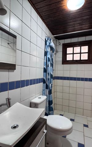 Casa de condomínio à venda com 250m², 4 quartos e 1 vagaBanheiro Social