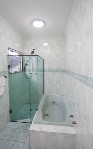 Casa à venda com 290m², 3 quartos e 6 vagasBanheiro da Suíte 3