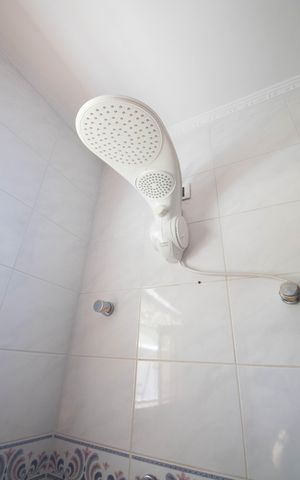 Casa à venda com 290m², 3 quartos e 6 vagasBanheiro da Suíte 2