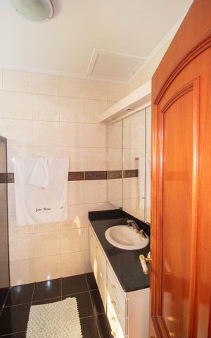 Casa à venda com 290m², 3 quartos e 6 vagasBanheiro da Suíte 1