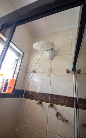 Casa à venda com 290m², 3 quartos e 6 vagasBanheiro da Suíte 1