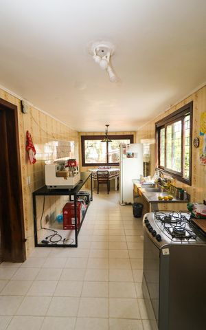 Casa à venda com 140m², 4 quartos e 4 vagas Casa à venda com 140m², 4 quartos e 4 vagasCozinha