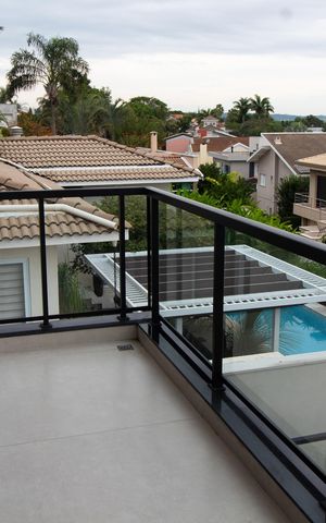 Casa de condomínio à venda com 531m², 4 quartos e 4 vagas Casa de condomínio à venda com 531m², 4 quartos e 4 vagasSacada Suíte 3