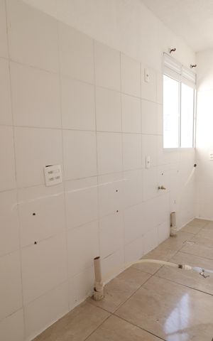 Apartamento à venda com 50m², 2 quartos e 1 vagaCozinha e Área de Serviço