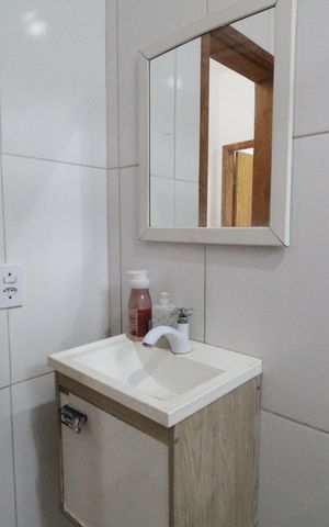 Casa de condomínio à venda com 135m², 3 quartos e 2 vagasBanheiro 2