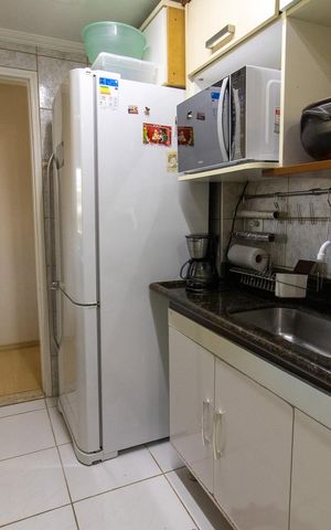 Apartamento à venda com 60m², 2 quartos e 1 vaga Apartamento à venda com 60m², 2 quartos e 1 vagaCozinha e Área de Serviço