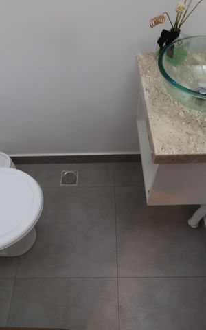 Casa à venda com 123m², 2 quartos e 2 vagasLavabo Sala