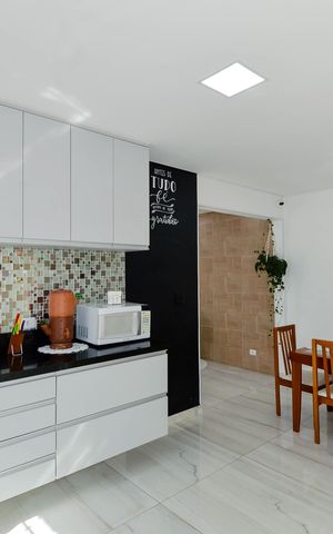 Casa à venda com 170m², 4 quartos e 3 vagas Casa à venda com 170m², 4 quartos e 3 vagasCozinha