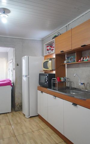 Casa à venda com 85m², 2 quartos e 2 vagasCozinha