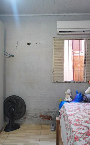 Casa à venda com 85m², 2 quartos e 2 vagasQuarto 1