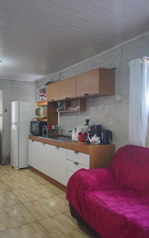Casa à venda com 85m², 2 quartos e 2 vagasSala