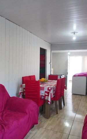Casa à venda com 85m², 2 quartos e 2 vagasSala