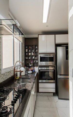 Apartamento à venda com 56m², 2 quartos e 2 vagas Apartamento à venda com 56m², 2 quartos e 2 vagasCozinha