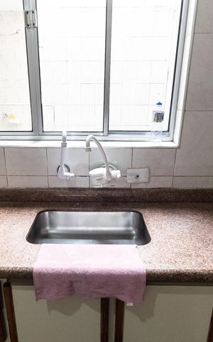Casa à venda com 130m², 3 quartos e 2 vagas Casa à venda com 130m², 3 quartos e 2 vagasCozinha
