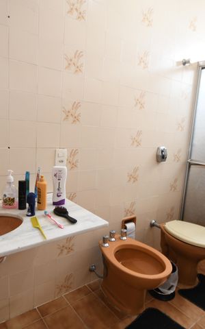 Casa à venda com 285m², 4 quartos e 3 vagasBanheiro Suíte 1